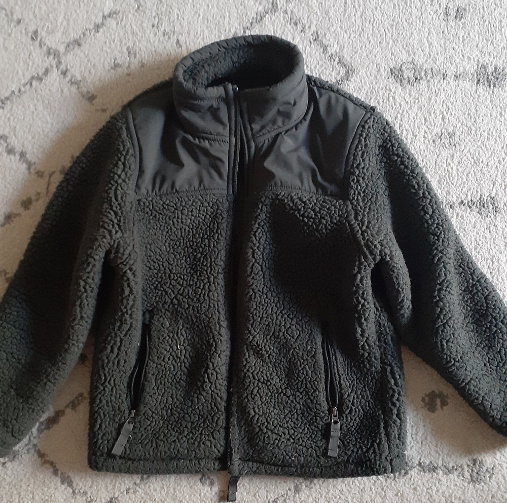 32 Heat brand kids jacket in dark green size extra small.